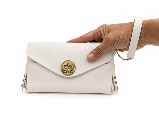 L'Essenziale — Clutch in Cuoio Toscano